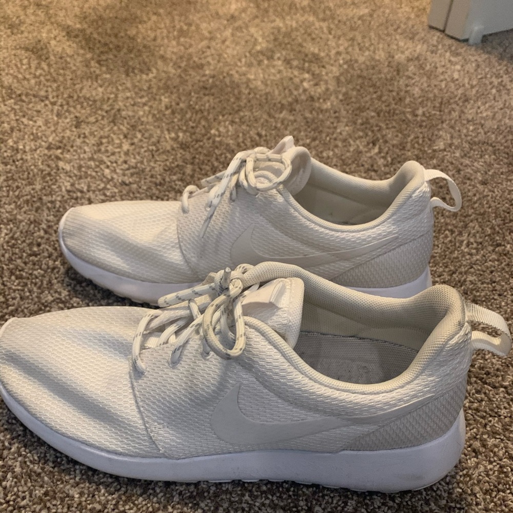 All white nike running shoes